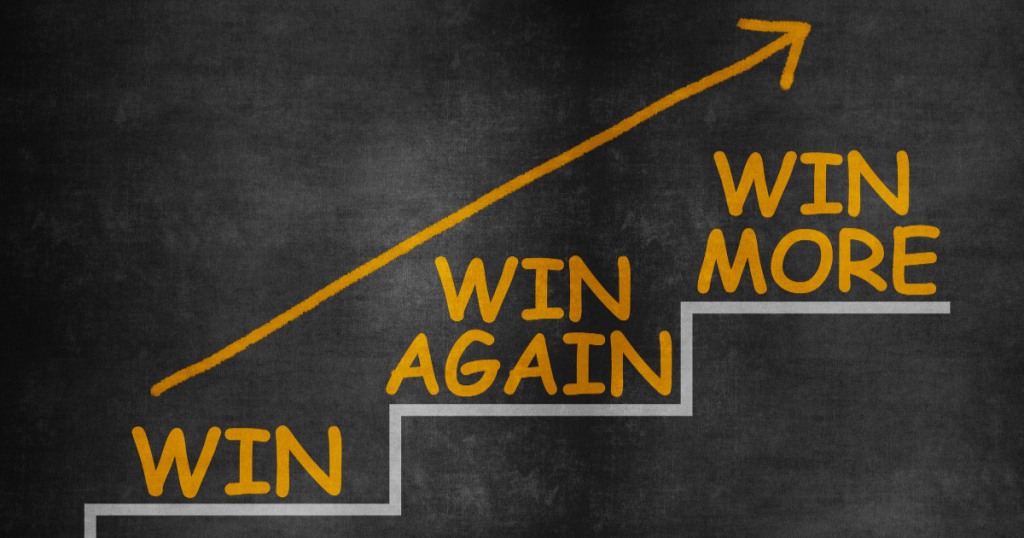 Steps showing “Win, Win Again, Win More” with an upward arrow