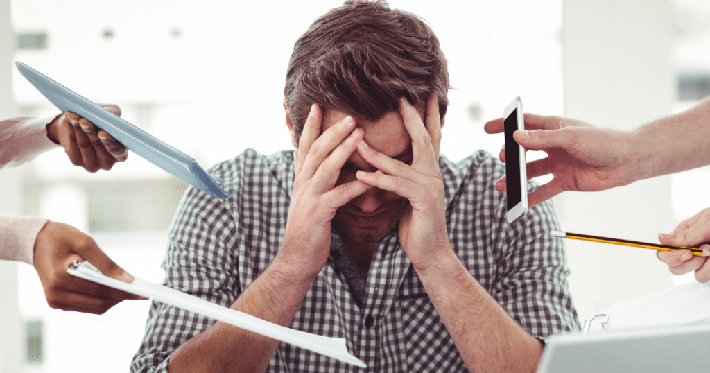 Overwhelmed landlord juggling rental property responsibilities